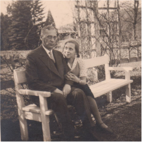 Dr. Max Gerson and Charlotte Gerson sitting on bench
